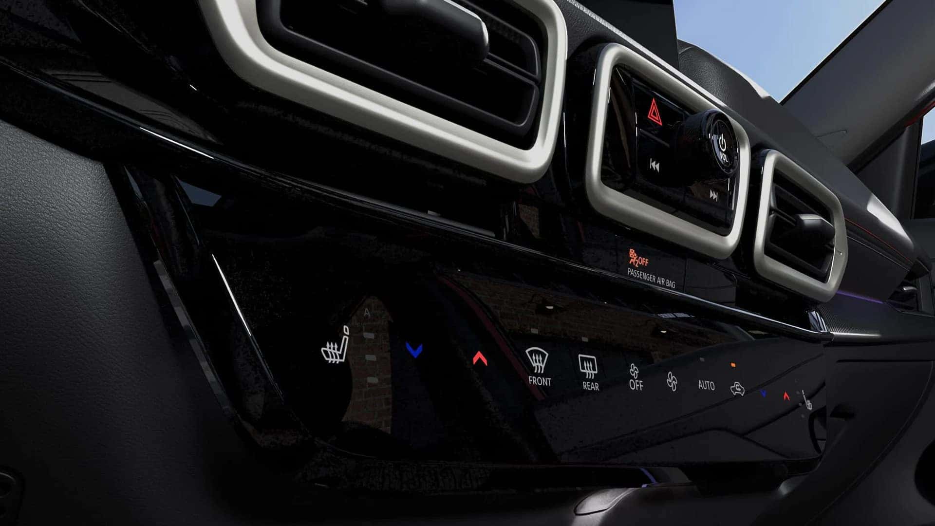 2026 Nissan Sentra climate control panel with heated-seat controls, air vents, and audio controls