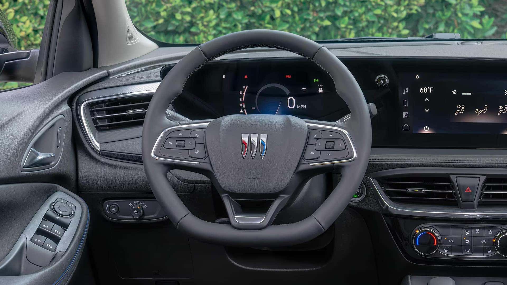 2026 Buick Encore GX steering wheel, digital driver display, and infotainment touchscreen
