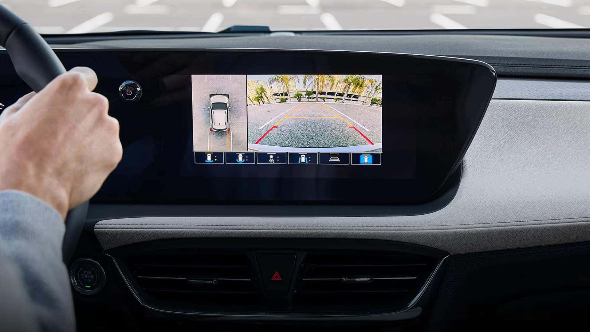 2026 Buick Encore GX touchscreen displaying overhead and rear camera views with parking guidelines