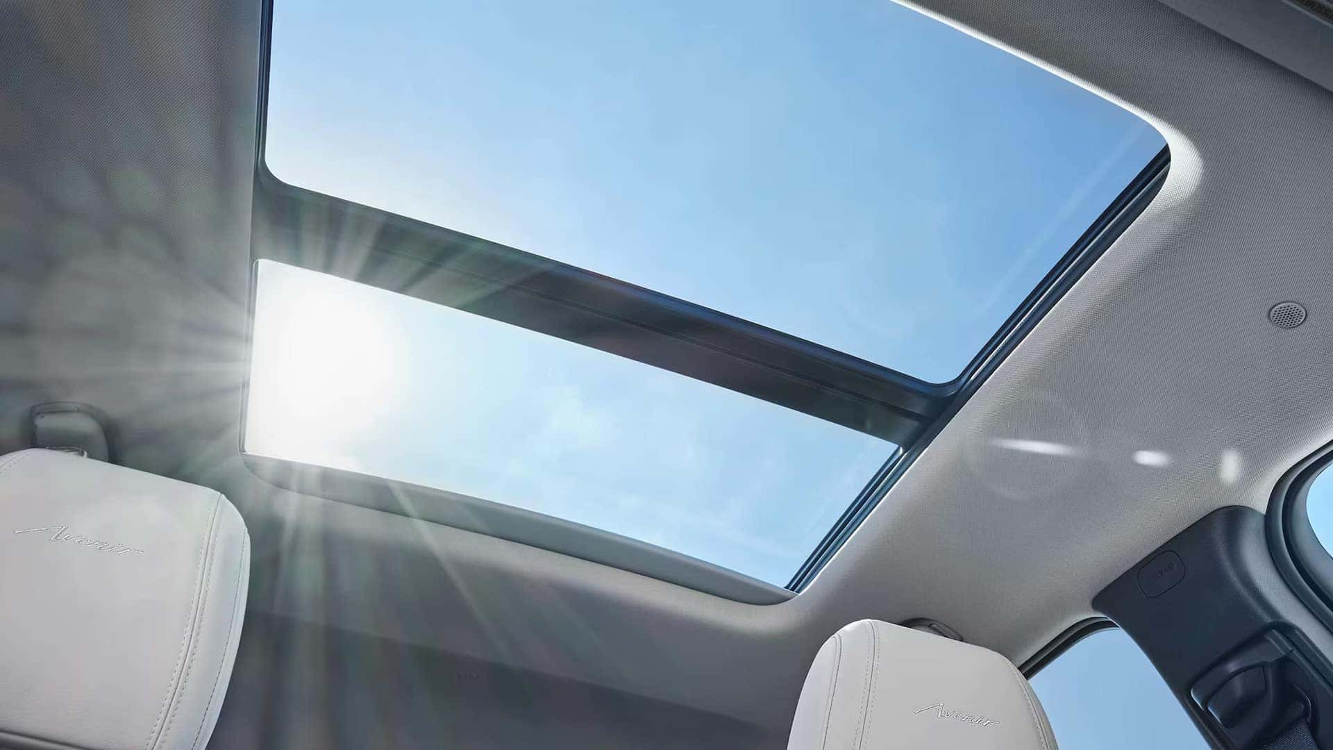 Panoramic power moonroof above the 2026 Buick Encore GX Avenir cabin