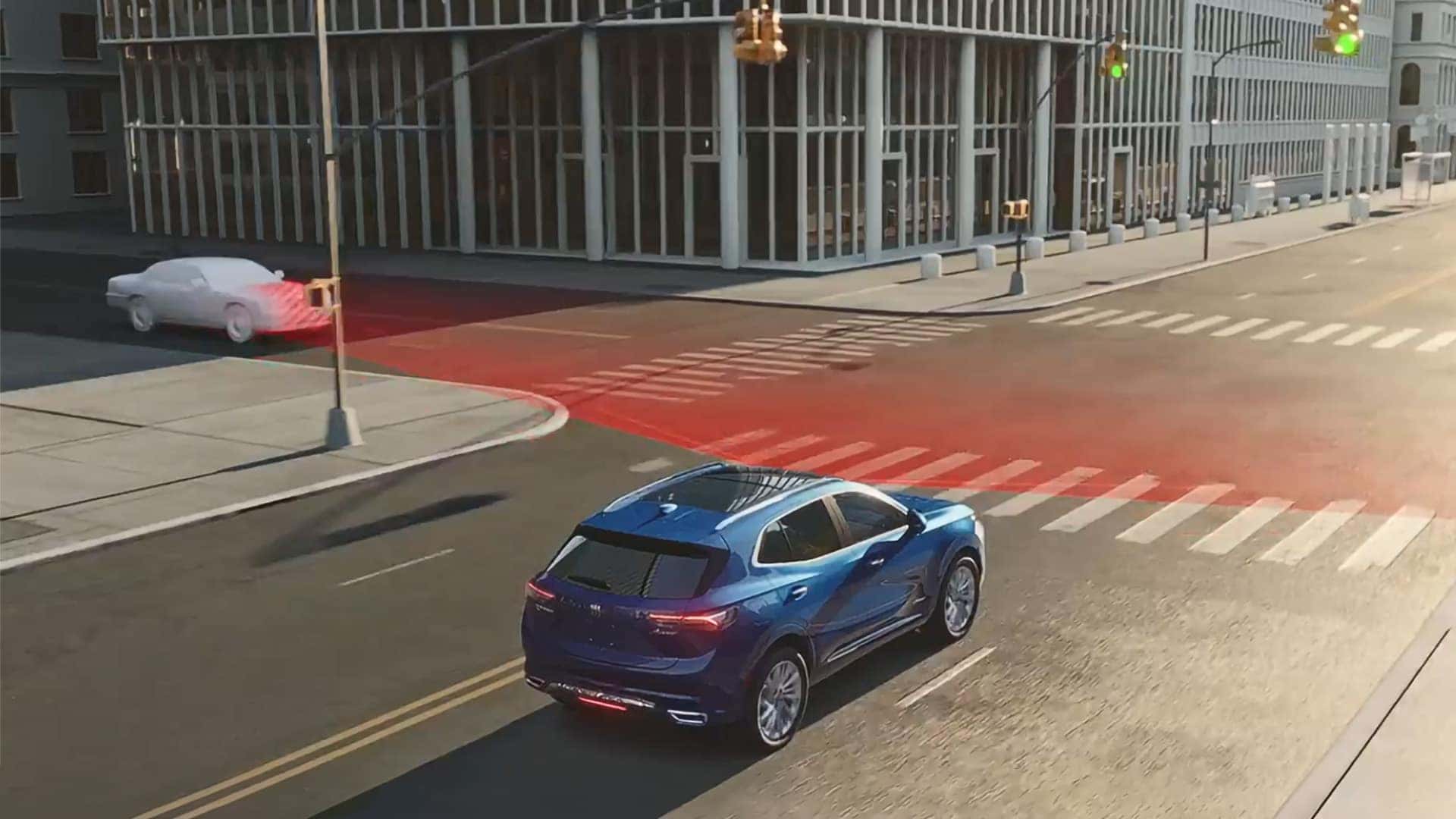 Buick Envision approaching an intersection with automatic emergency braking detection shown
