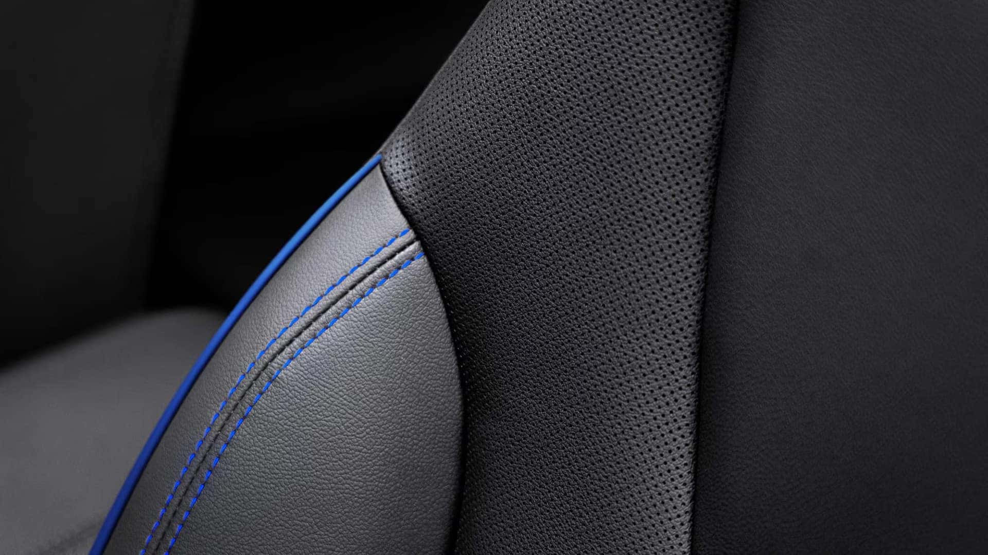 Black perforated Sport Touring seat with Santorini Blue stitching in the 2026 Buick Encore GX