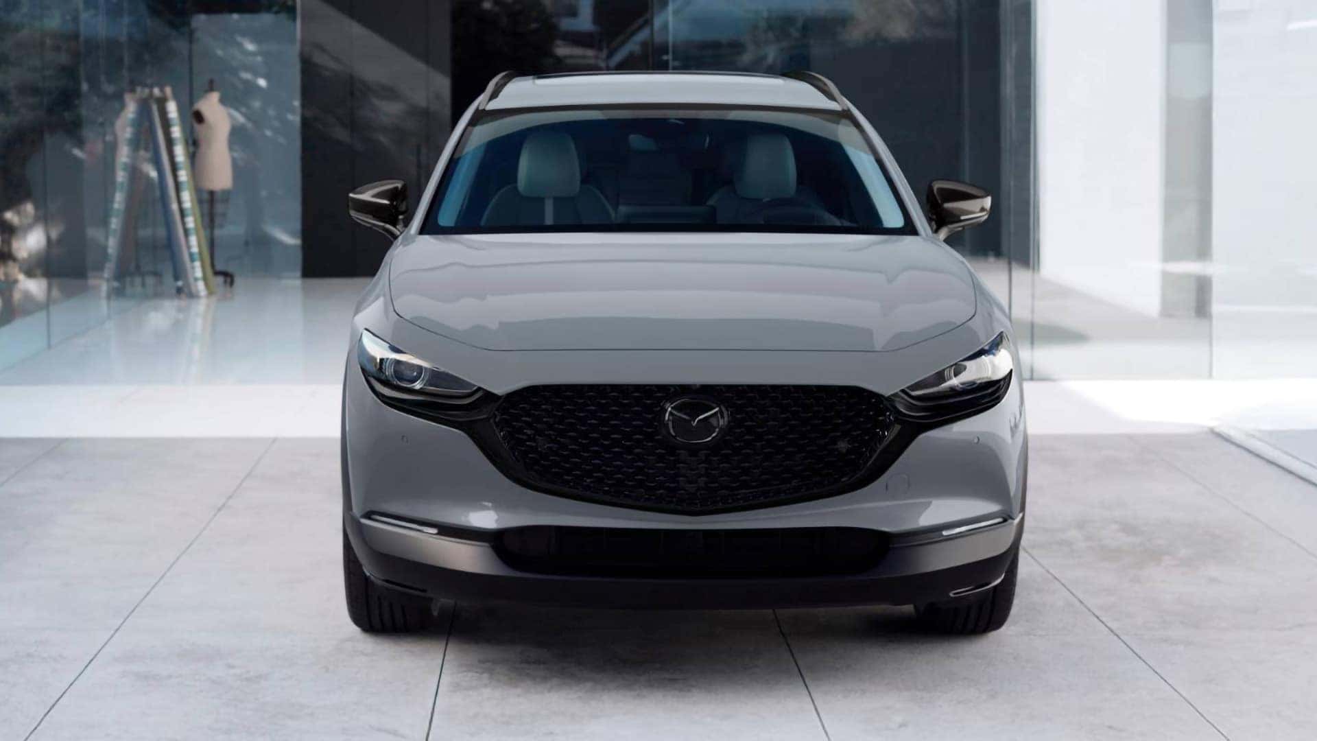 Front view of a white 2026 Mazda CX-30 with LED lighting and a black grille