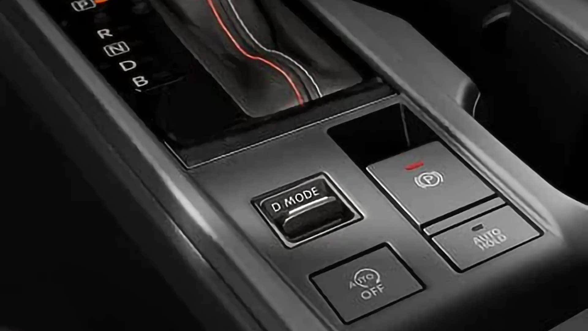 2026 Nissan Sentra center console with drive mode selector, electronic parking brake, and Auto Hold controls