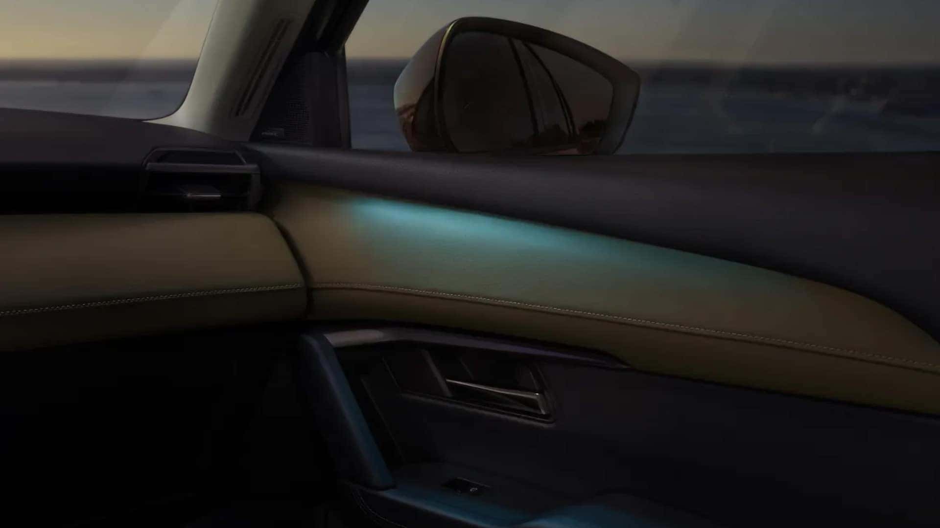 Blue ambient door-panel lighting inside the 2026 Mazda CX-5 cabin