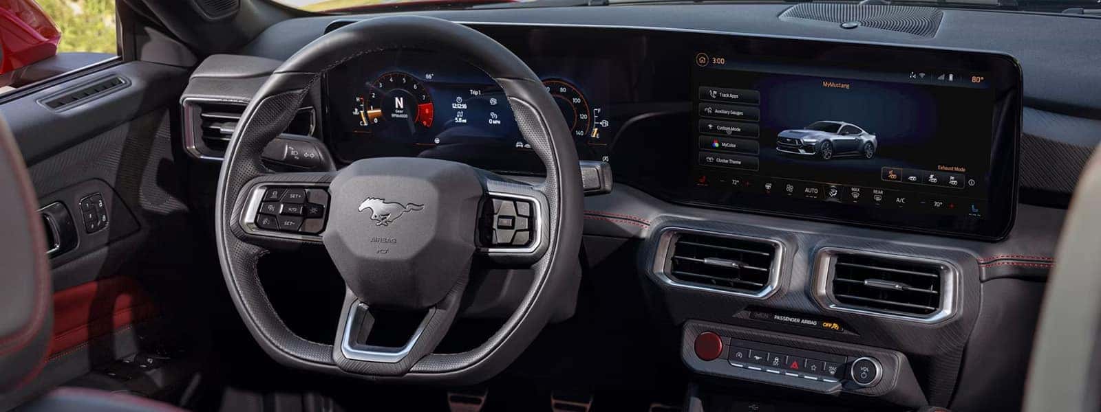 2026 Ford Mustang interior with digital instrument cluster, center touchscreen, steering wheel, and performance technology controls