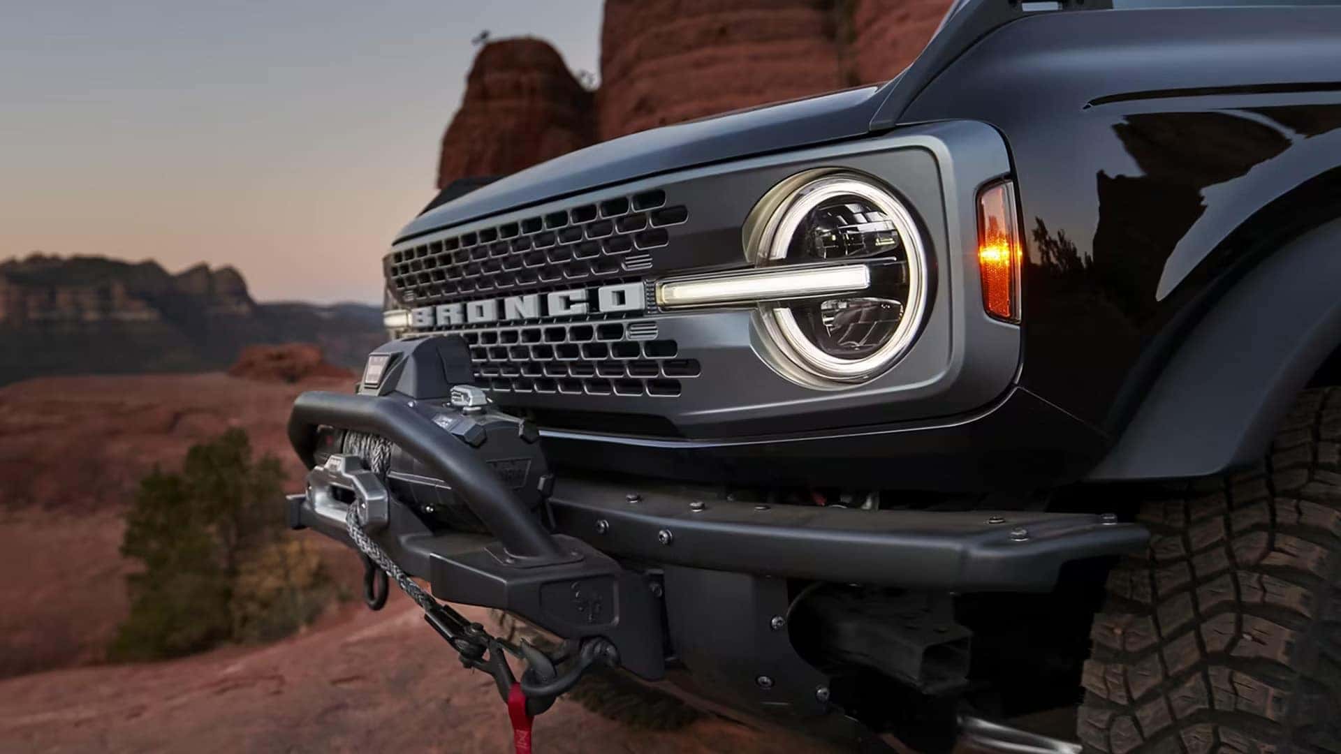 Front grille and signature BRONCO lettering on a 2026 Ford Bronco