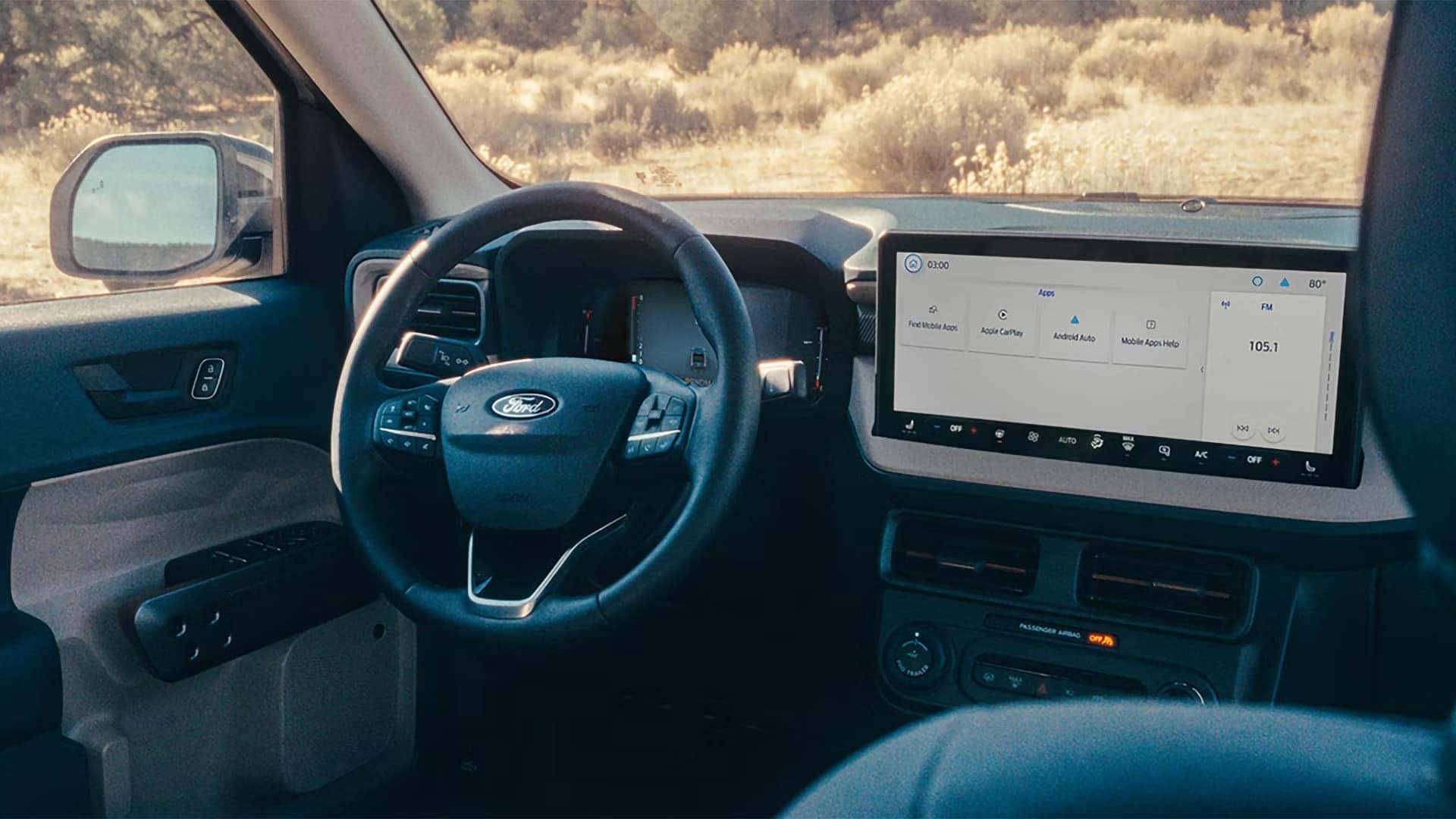 2026 Ford Maverick interior showing the digital cluster and touchscreen app menu