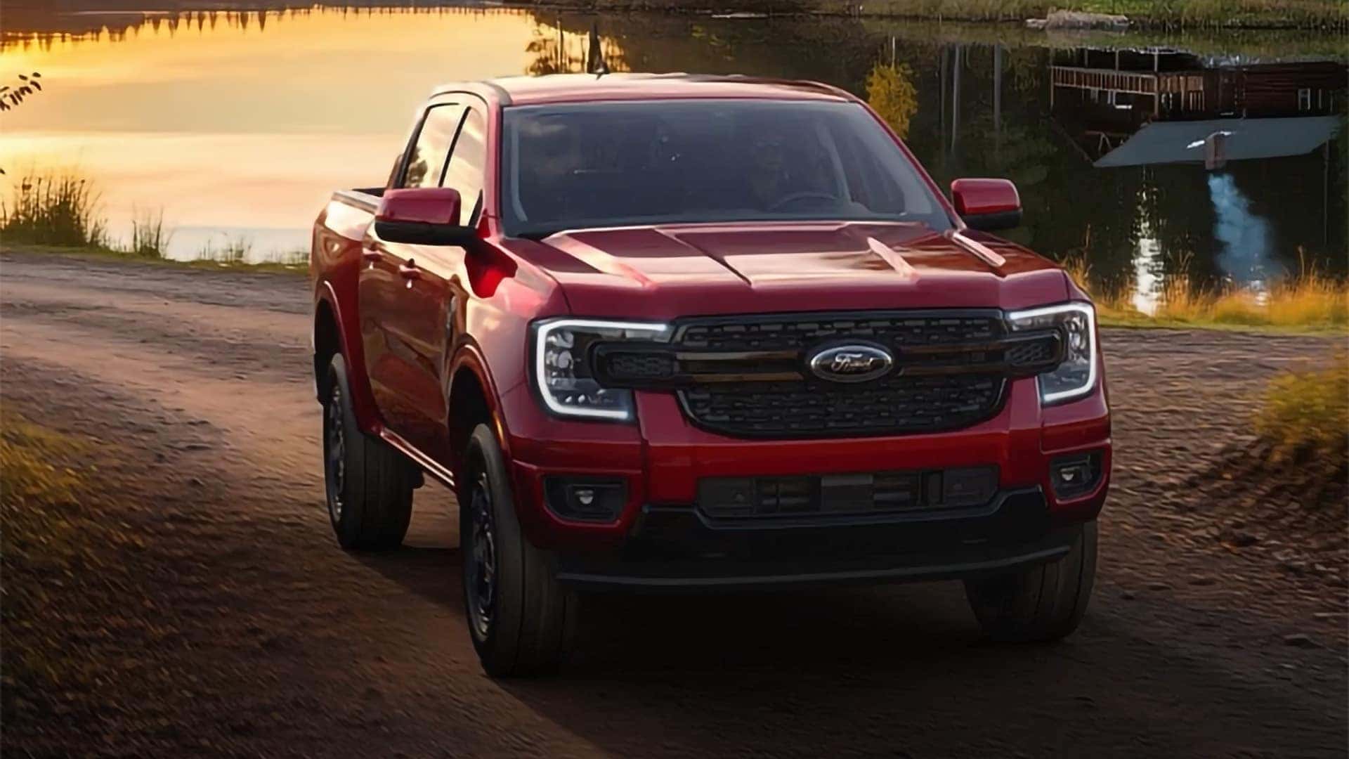 Red 2026 Ford Ranger showing the front grille, Ford badge, LED lighting, and hood design