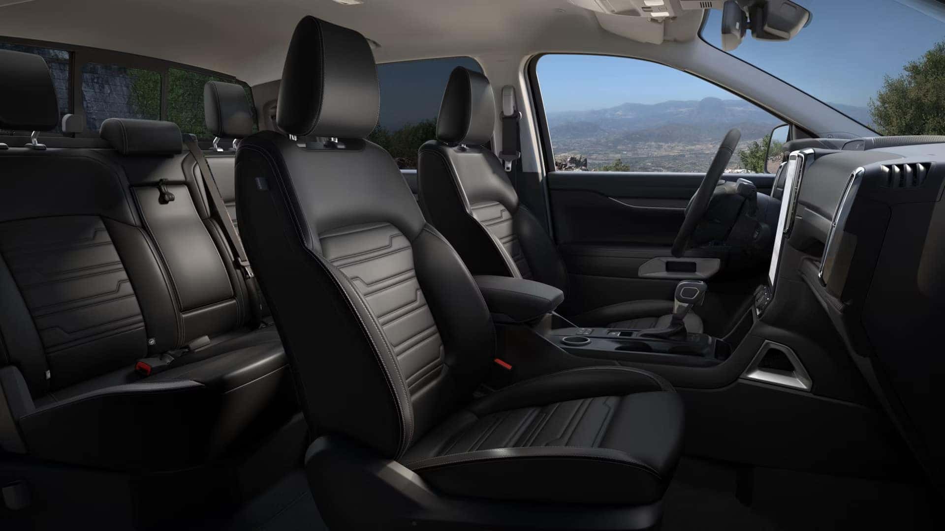 2026 Ford Ranger cabin with front bucket seats, rear bench seating, dashboard, and center console