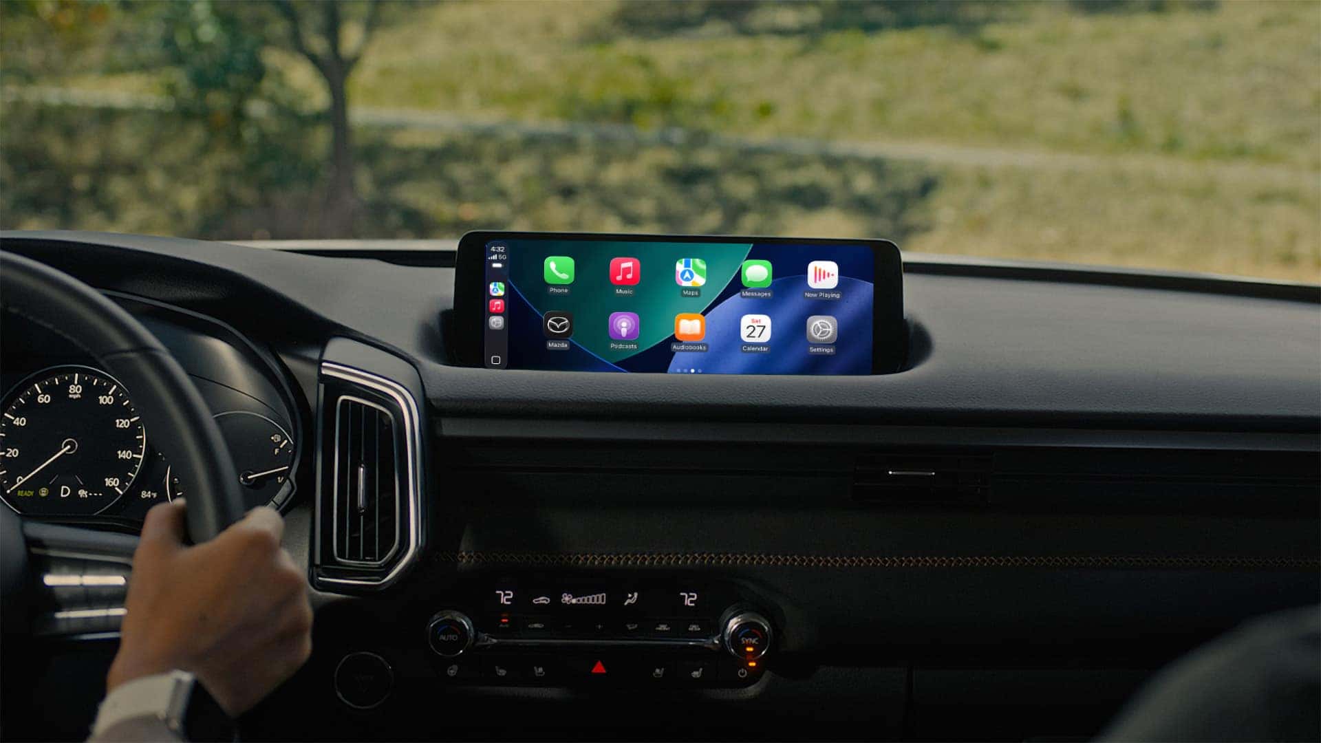 2026 Mazda CX-50 Hybrid center display showing wireless Apple CarPlay apps