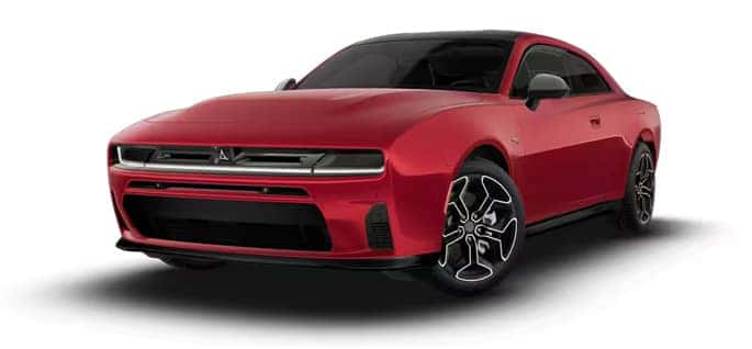 Red two-door Dodge Charger shown from a front three-quarter angle with black wheels and a white front light bar.