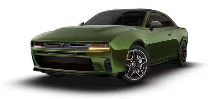 Green two-door Dodge Charger shown from a front three-quarter angle with dark wheels and amber front lights.