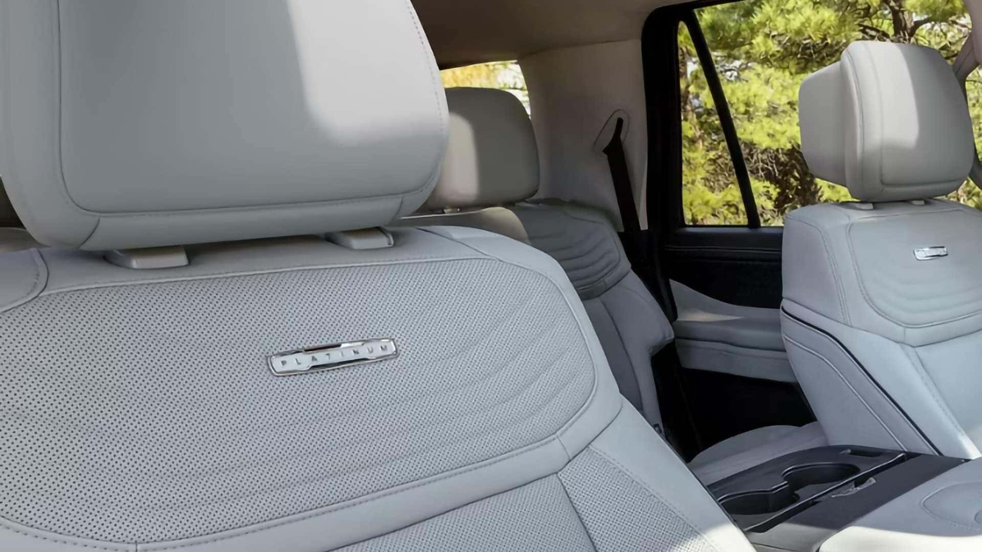 2026 Ford Expedition Platinum interior with perforated leather seating and second-row captain's chairs