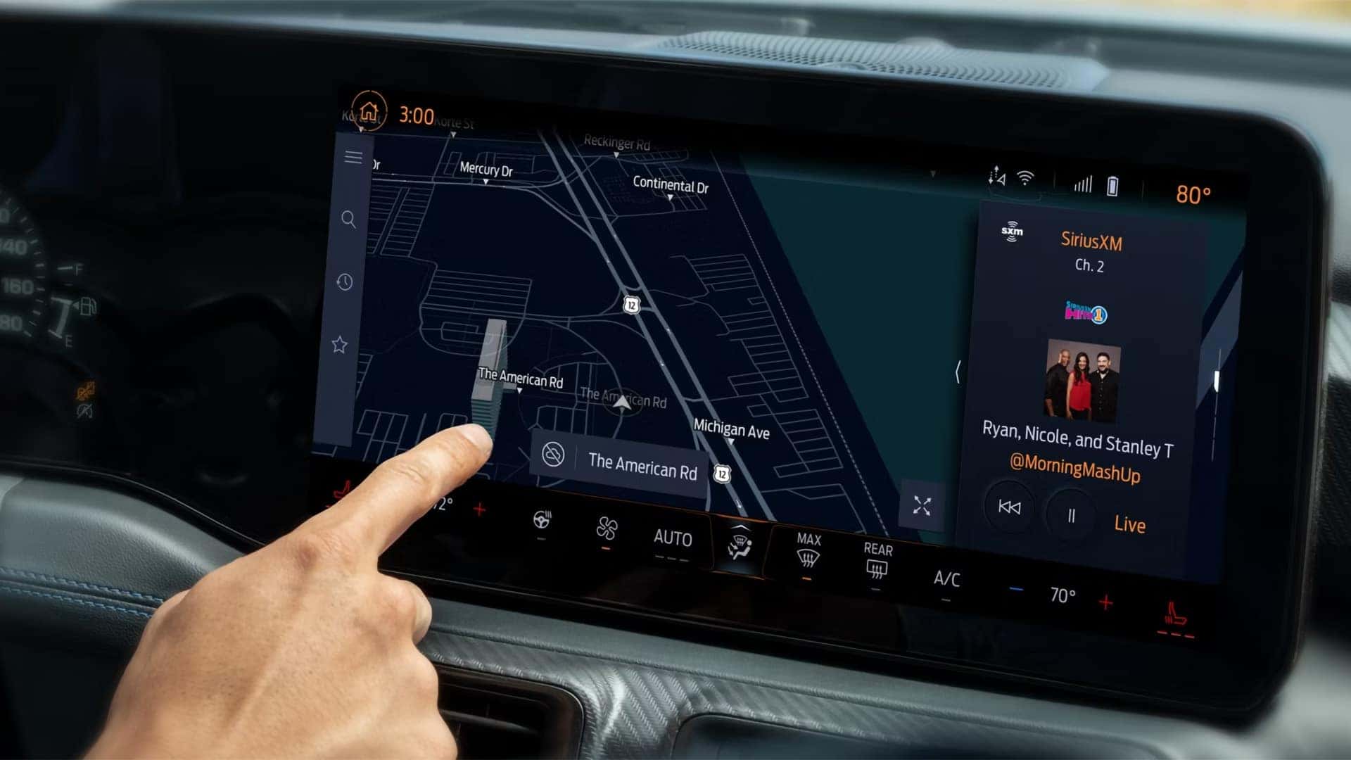 2026 Ford Mustang center touchscreen displaying navigation and SiriusXM through the SYNC 4 infotainment system