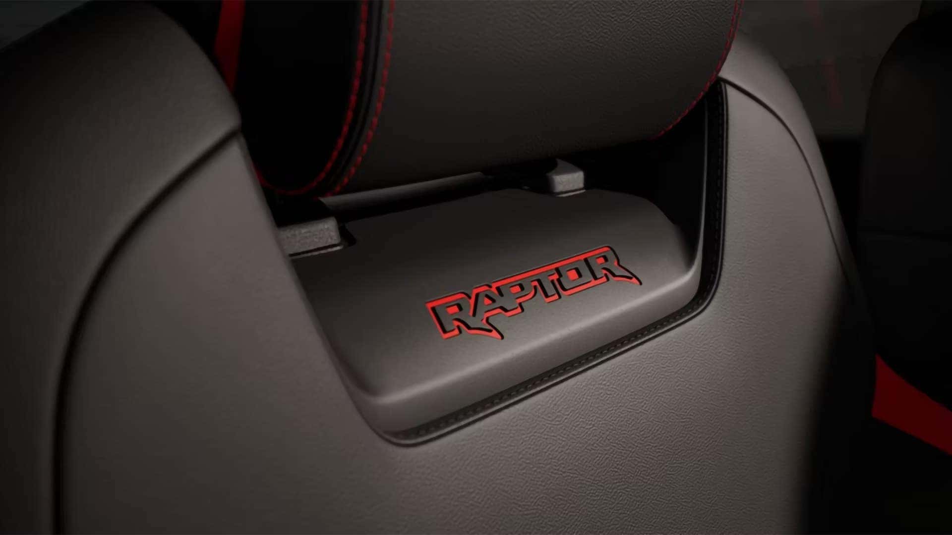 2026 Ford Ranger Raptor seat detail with Raptor logo and red accent stitching