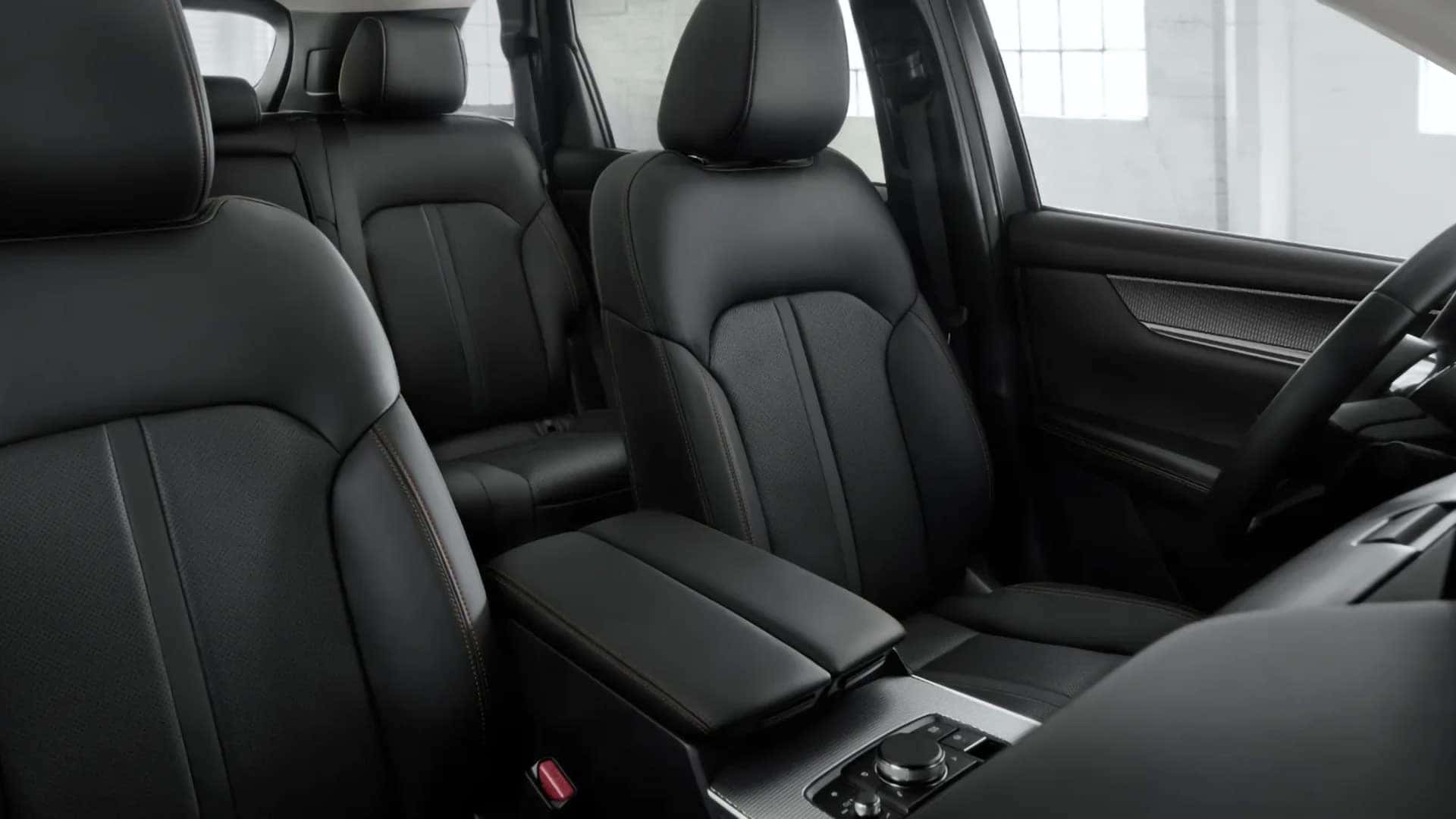 Black leather-trimmed front and rear seats inside the 2026 Mazda CX-70 PHEV
