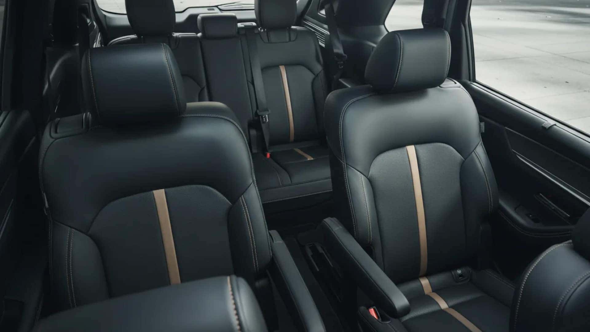 Black leather seating across all three rows of the 2026 Mazda CX-90 PHEV interior