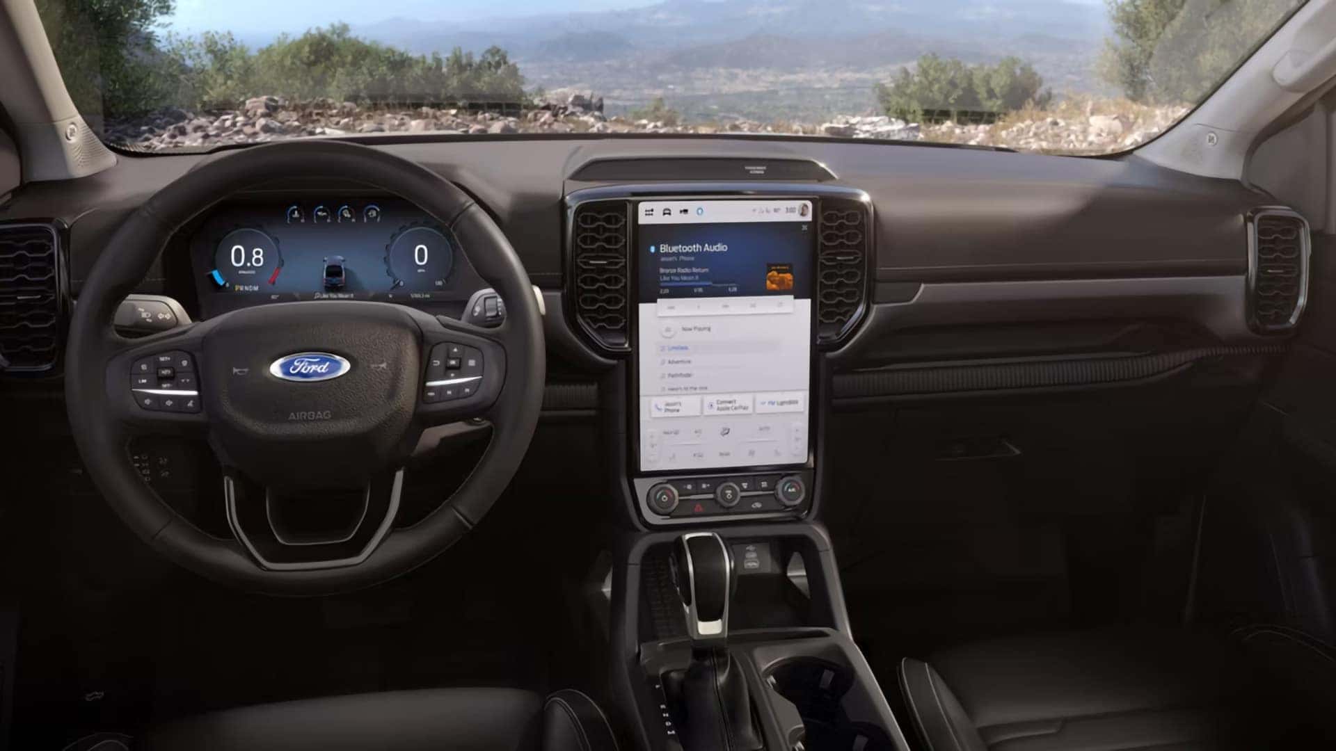 2026 Ford Ranger dashboard with digital driver display, steering wheel, and vertical center touchscreen