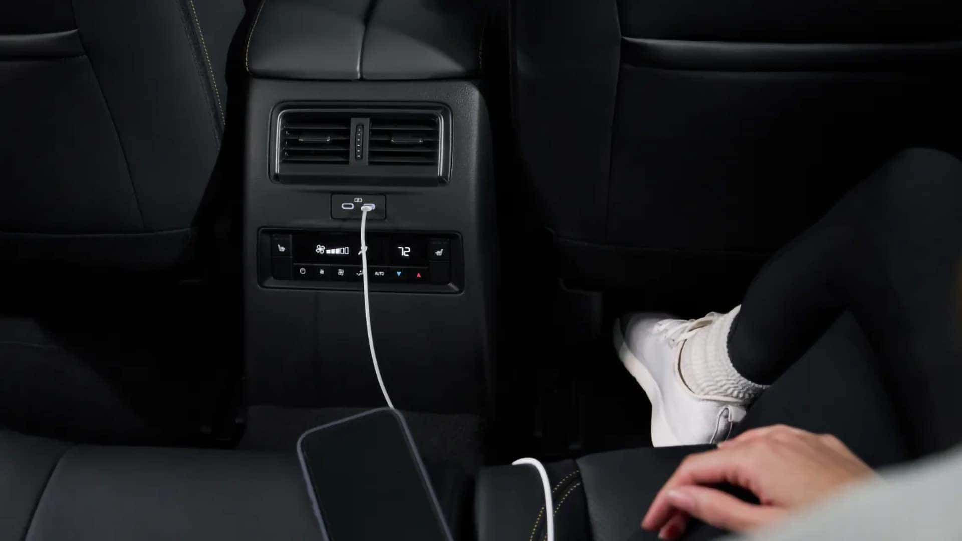Rear USB-C charging ports and climate controls inside the 2026 Mazda CX-70 PHEV