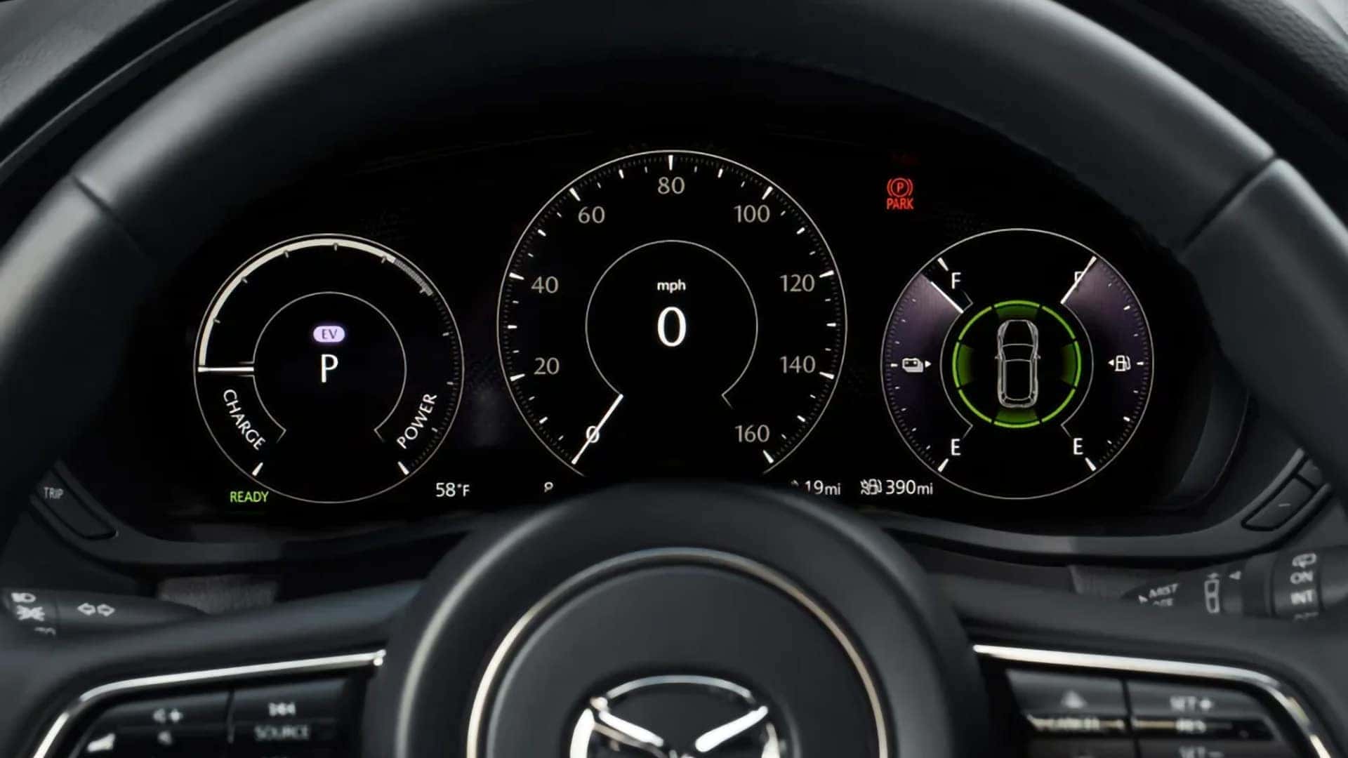 Digital instrument cluster in the 2026 Mazda CX-90 PHEV displaying EV power and driving range