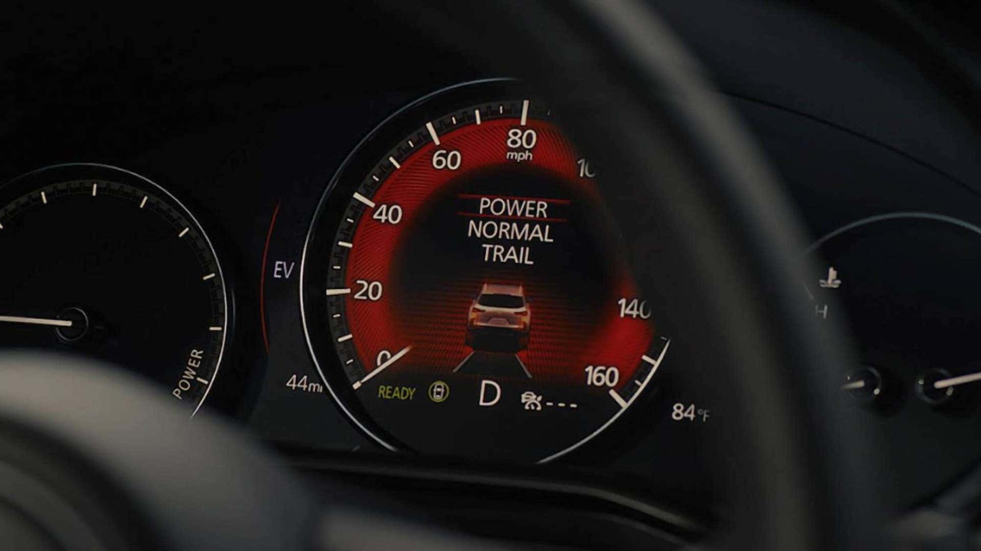 2026 Mazda CX-50 Hybrid instrument display showing Power, Normal, and Trail drive modes