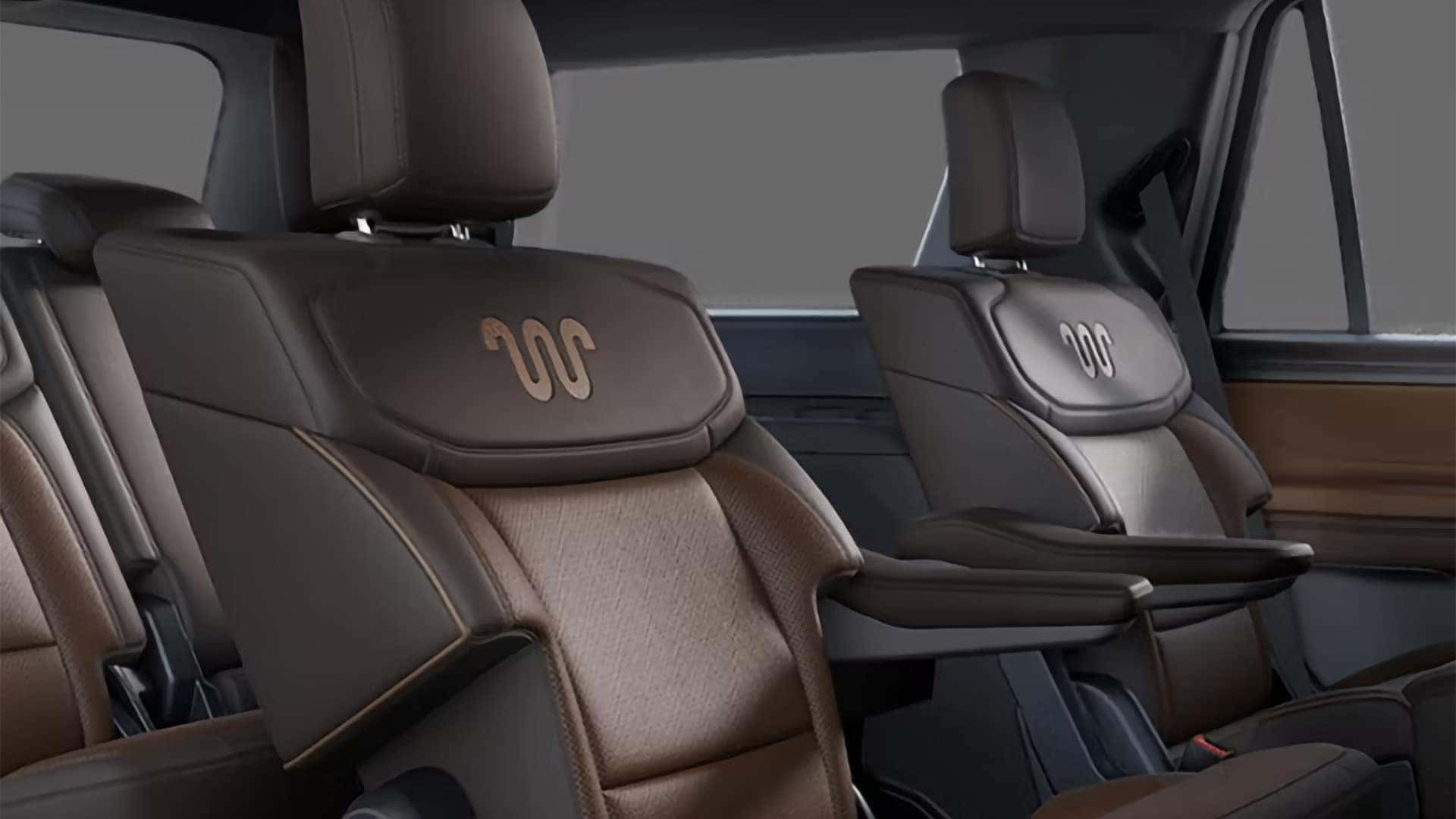 2026 Ford Expedition King Ranch second-row captain's chairs with distinctive leather trim and branding