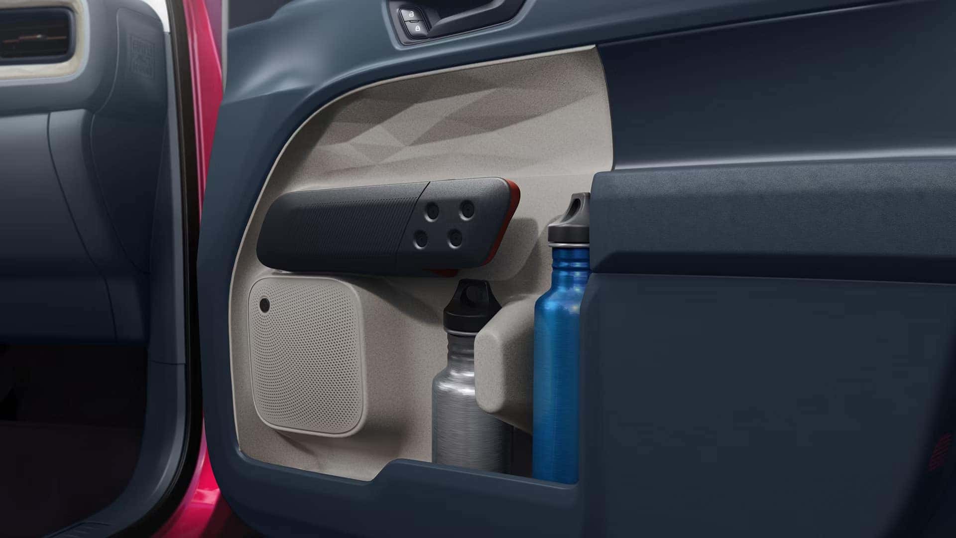 Ford Maverick door storage pockets holding two water bottles