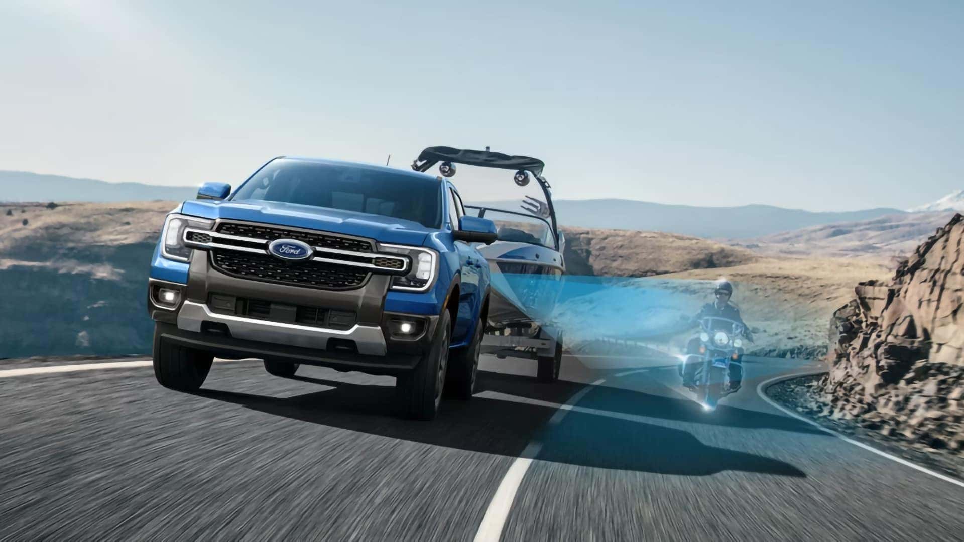 2026 Ford Ranger towing a trailer with driver-assist technology illustrated on the road