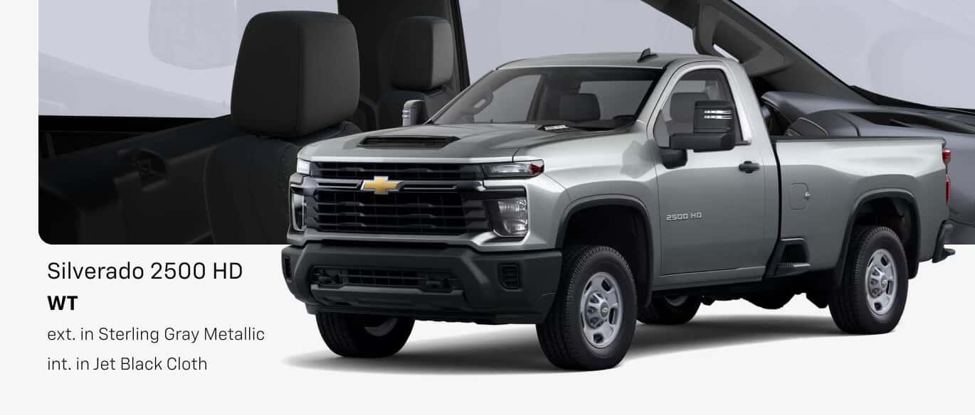 Front three-quarter studio view of a 2026 Chevrolet Silverado 2500 HD WT in Sterling Gray Metallic with black front bumper.
