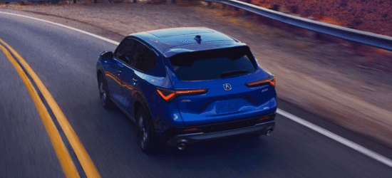 2025 Acura ADX Blue Driving on the road